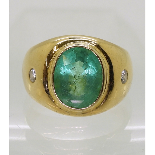 2722 - A GENTS EMERALD & DIAMOND RINGmounted in bright yellow metal, set with a 12mm x 10mm x 7.5mm ova... 