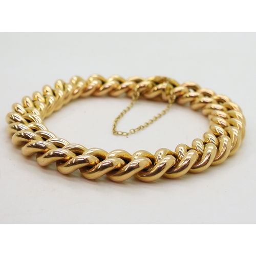 2724 - A 15CT GOLD CURB CHAIN BRACELETstamped 15ct to the clasp, length 20cm, weight 25.5gms... 