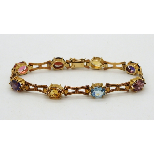 2728 - A MULTI GEM BRACELETmade in 9ct gold by Cropp & Farr, set with oval gemstones to include amethys... 