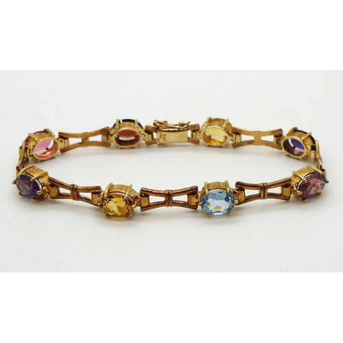 2728 - A MULTI GEM BRACELETmade in 9ct gold by Cropp & Farr, set with oval gemstones to include amethys... 