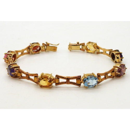 2728 - A MULTI GEM BRACELETmade in 9ct gold by Cropp & Farr, set with oval gemstones to include amethys... 