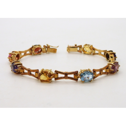 2728 - A MULTI GEM BRACELETmade in 9ct gold by Cropp & Farr, set with oval gemstones to include amethys... 