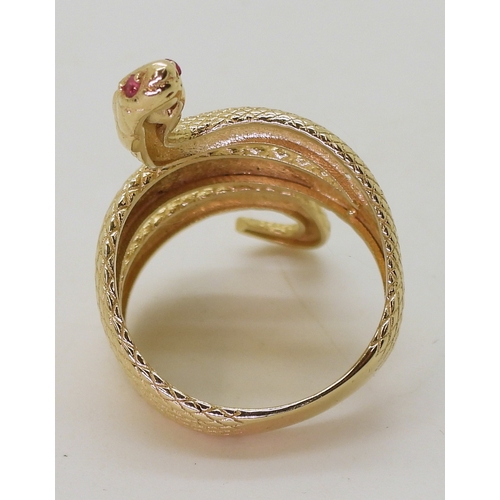 2729 - A 14K GOLD SNAKE RINGthe highly textured snake has ruby eyes, with lasered hallmark 585, finger size... 