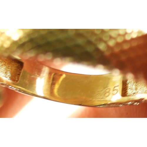 2729 - A 14K GOLD SNAKE RINGthe highly textured snake has ruby eyes, with lasered hallmark 585, finger size... 