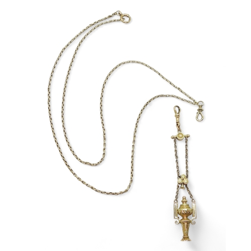 2733 - A VINTAGE GUARD CHAIN & PENDANT FOBthe pendant fob in three colour gold with urn design, faintly... 