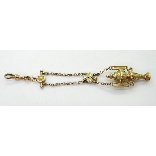 2733 - A VINTAGE GUARD CHAIN & PENDANT FOBthe pendant fob in three colour gold with urn design, faintly... 