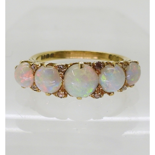 2738 - OPAL & DIAMOND FIVE STONE RINGnice lively opals, with rose cut diamond accents set between, in c... 