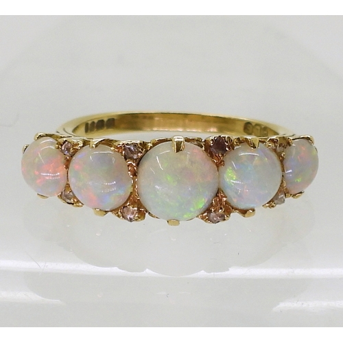 2738 - OPAL & DIAMOND FIVE STONE RINGnice lively opals, with rose cut diamond accents set between, in c... 