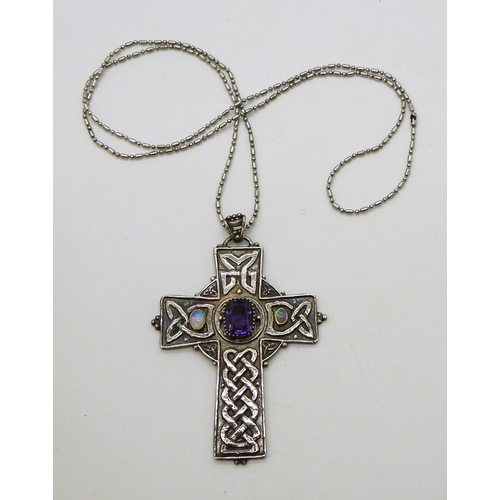 2739 - AN ARTS & CRAFTS CELTIC CROSSthe handmade white metal cross is hand chased with Celtic knotwork,... 