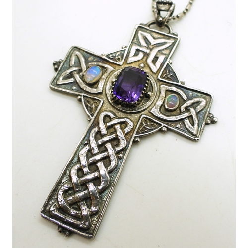 2739 - AN ARTS & CRAFTS CELTIC CROSSthe handmade white metal cross is hand chased with Celtic knotwork,... 