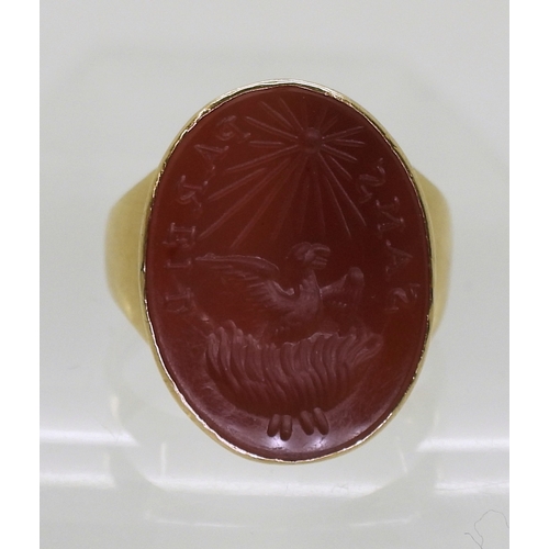 2741 - A CARNELIAN INTAGLIO RINGcarved with a Phoenix rising from the flames with the motto Sans Pareil - w... 