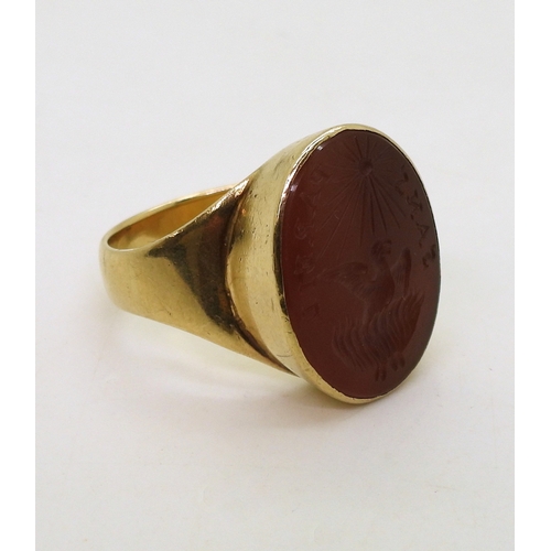 2741 - A CARNELIAN INTAGLIO RINGcarved with a Phoenix rising from the flames with the motto Sans Pareil - w... 