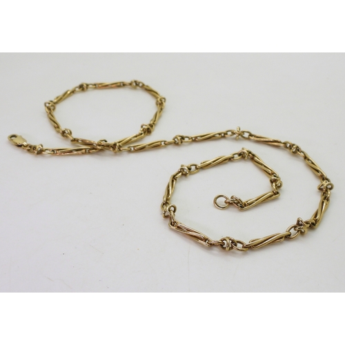 2745 - A 9CT GOLD FANCY CHAINwith twisted baton links. Length 52cm, weight 18.3gms