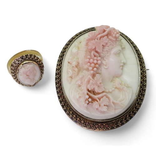 2749 - CONCH SHELL CAMEOSthe well carved cameo of a follower of Bacchus is mounted in a decorative gilded w... 