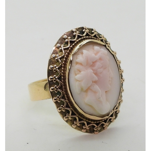 2749 - CONCH SHELL CAMEOSthe well carved cameo of a follower of Bacchus is mounted in a decorative gilded w... 