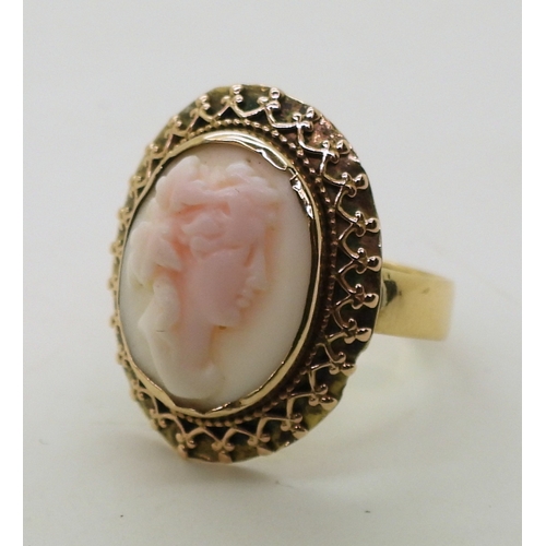 2749 - CONCH SHELL CAMEOSthe well carved cameo of a follower of Bacchus is mounted in a decorative gilded w... 