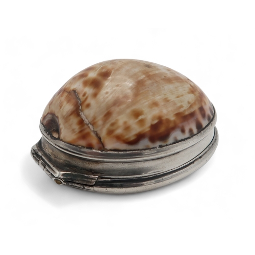 2500 - AN UNUSUAL SCOTTISH SILVER-MOUNTED COWRIE SHELL SNUFF BOXunmarked, inset with an amber cairngorm to ... 