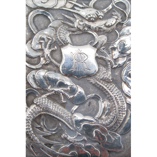 2502 - A CHINESE EXPORT SILVER CIGARETTE CASEby Wing Nam & Co, of rectangular form, decorated to the fr... 