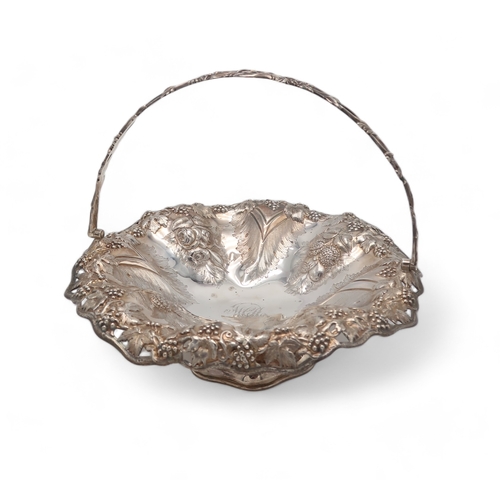 2507 - A VICTORIAN SILVER SWING-HANDLED CAKE BASKETby Thomas Bradbury & Sons, Sheffield 1864, of lobed ... 