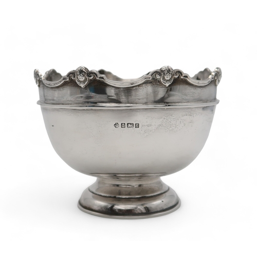 2508 - AN EDWARDIAN SILVER ROSE BOWLby William Hutton & Sons, Birmingham 1906, with an applied cherub b... 