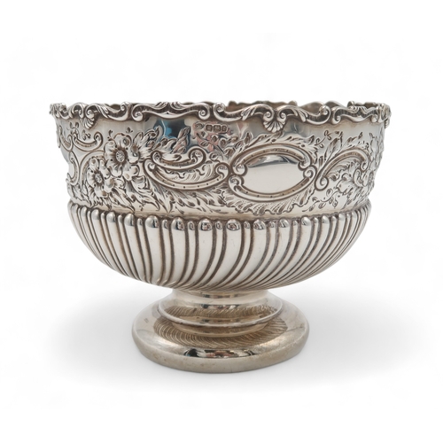 2509 - A LATE-VICTORIAN SILVER ROSE BOWLby John Round, Sheffield 1895, the body part-fluted, with a band of... 