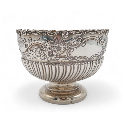 2509 - A LATE-VICTORIAN SILVER ROSE BOWLby John Round, Sheffield 1895, the body part-fluted, with a band of... 