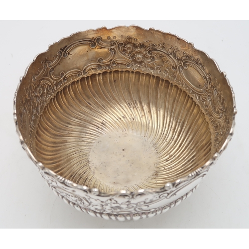 2509 - A LATE-VICTORIAN SILVER ROSE BOWLby John Round, Sheffield 1895, the body part-fluted, with a band of... 