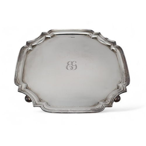 2510 - A GEORGE V SILVER SALVERby Walker & Hall, Sheffield 1930, of shaped square form, monogrammed 'EG... 