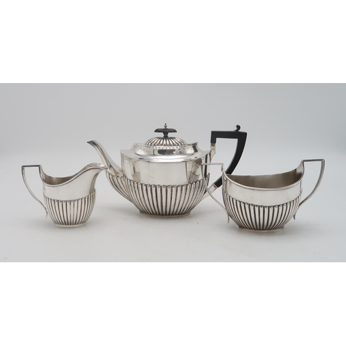 2514 - A GEORGE V THREE PIECE SILVER TEA SERVICEby James & William Deakin, Sheffield 1924, in the Queen... 