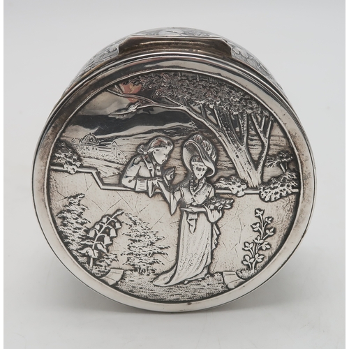 2519 - AN EDWARDIAN SILVER CIRCULAR BOXby Blackburn & Tysall, London 1903, the lid with repousse decora... 