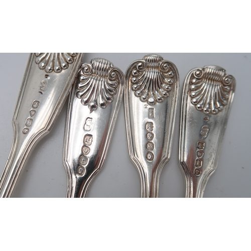 2520 - A MATCHED SET OF VICTORIAN SILVER CUTLERYin the fiddle, thread and shell pattern, including eight ta... 