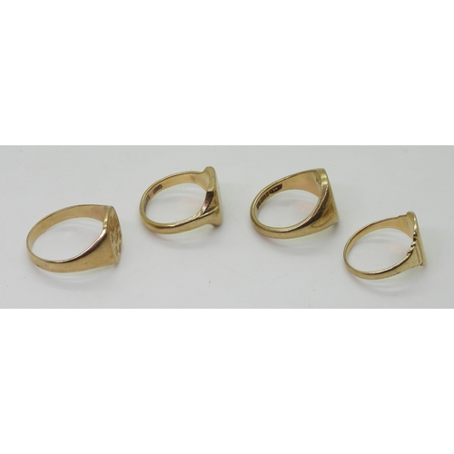 9007 - Four 9ct gold signet rings, millennium hallmark to front, size Z1/2, oval faced size U, and two othe... 