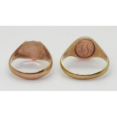 9013 - Two 9ct gold Masonic signet rings, enamel swivel example,  Gents size 2, together with a shield shap... 
