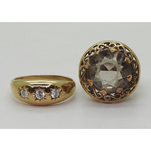 9016 - A 9ct gold dome ring with three star set cubic zirconas, size U, together with a 9ct retro smoky qua... 