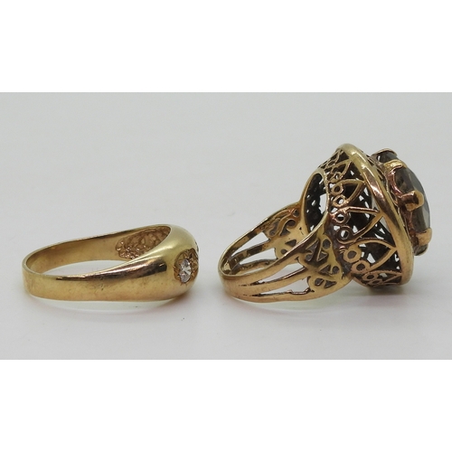 9016 - A 9ct gold dome ring with three star set cubic zirconas, size U, together with a 9ct retro smoky qua... 