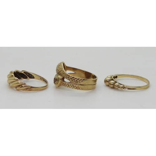 9020 - Three 9ct gold rings, a snake ring, size O1/2, a bobble ring size O1/2, and another size N, weight 8... 