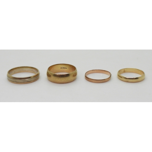 9023 - Four 9ct gold wedding rings, bi colour size W, wide size U, the other two both P1/2, weigh together ... 