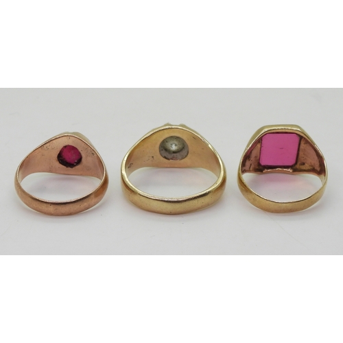 9028 - Three 9ct gold gem set rings, Cz gypsy ring size X, a 9ct Jayem pink glass signet, size P1/2, and a ... 