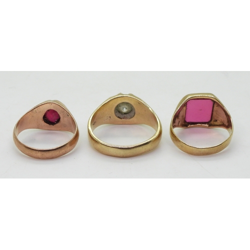 9028 - Three 9ct gold gem set rings, Cz gypsy ring size X, a 9ct Jayem pink glass signet, size P1/2, and a ... 