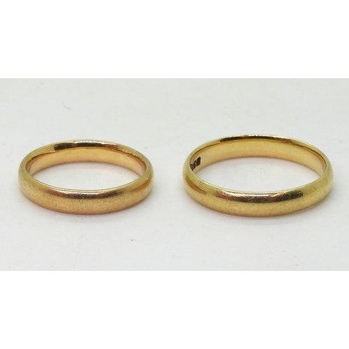 9033 - Two 18ct gold Glasgow hallmarked wedding rings, dated 1913 size W and 1925 size P1/2, weight 9.8gms