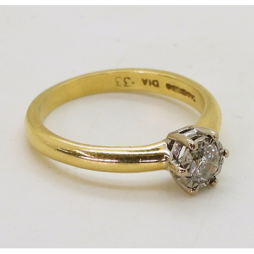 9034 - An 18ct gold 0.25ct diamond solitaire ring, in a star cut illusion setting. Finger size L1/2, weight... 