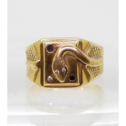 9038 - An 18ct gold Italian made snake detailed signet ring, with clear gem set eyes size O, weight 4.9gms