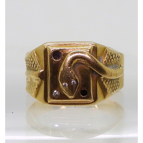 9038 - An 18ct gold Italian made snake detailed signet ring, with clear gem set eyes size O, weight 4.9gms