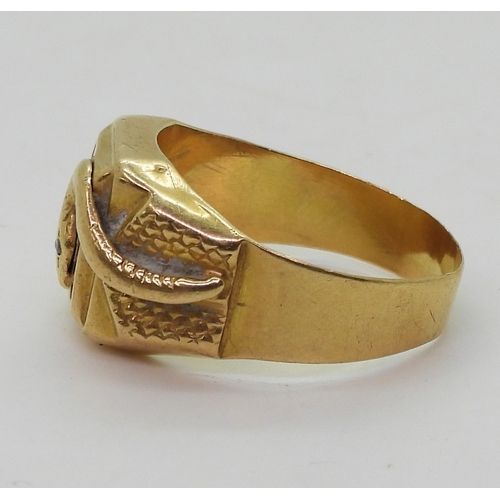 9038 - An 18ct gold Italian made snake detailed signet ring, with clear gem set eyes size O, weight 4.9gms