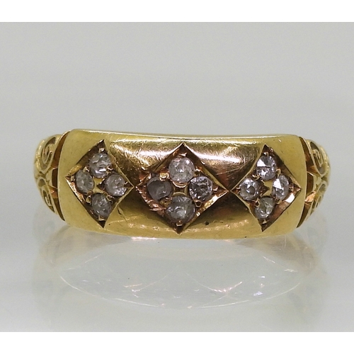 9044 - A Victorian 18ct gold diamond ring, set with panels of old cut diamonds and scrolled shoulders, Birm... 