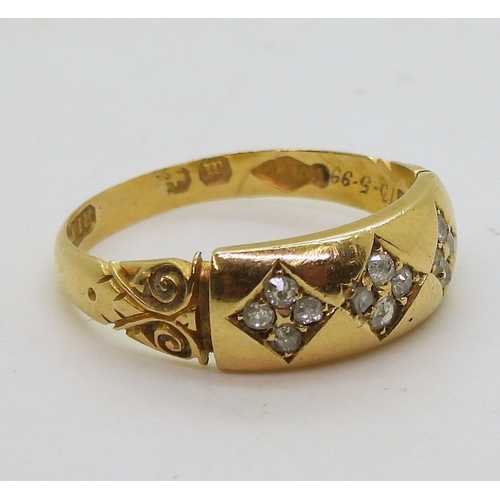 9044 - A Victorian 18ct gold diamond ring, set with panels of old cut diamonds and scrolled shoulders, Birm... 