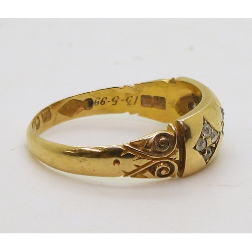 9044 - A Victorian 18ct gold diamond ring, set with panels of old cut diamonds and scrolled shoulders, Birm... 