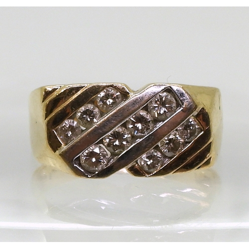 9050 - An 18ct gold ring set with estimated approx 0.70cts of brilliant cut diamonds, finger size V1/2, wei... 