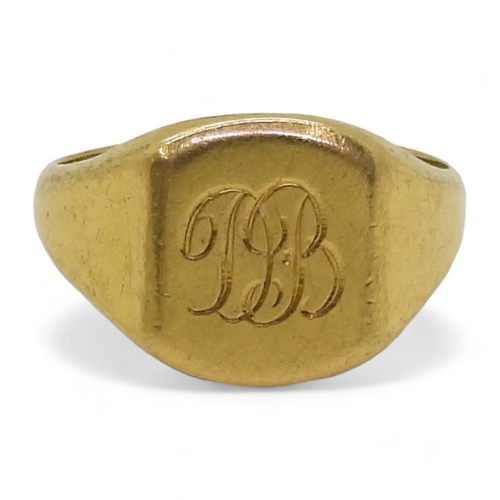 9062 - An 18ct gold signet ring with Birmingham hallmarks for 1966, size R, weight 8.1gms