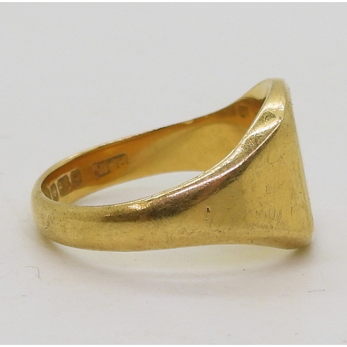 9062 - An 18ct gold signet ring with Birmingham hallmarks for 1966, size R, weight 8.1gms